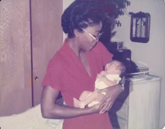 Arlinda with a baby