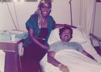 Arlinda caring for a friend in hospital